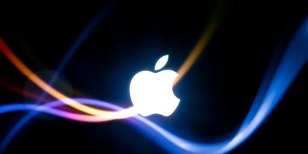 Apple logo with vibrant light streaks.